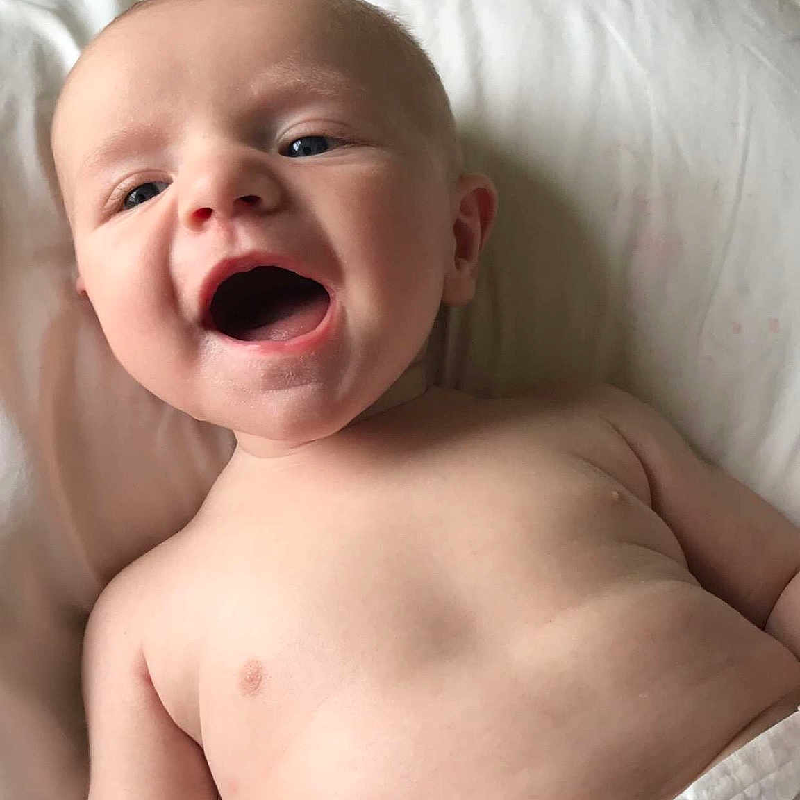 Kolton is registered to the contest to win money with this photo: baby, baby_making_funny_faces, cheek, child, chin, face, facial_expression, head, laugh, lip, mouth, muscle, neck, nose, person, skin, smile, toddler