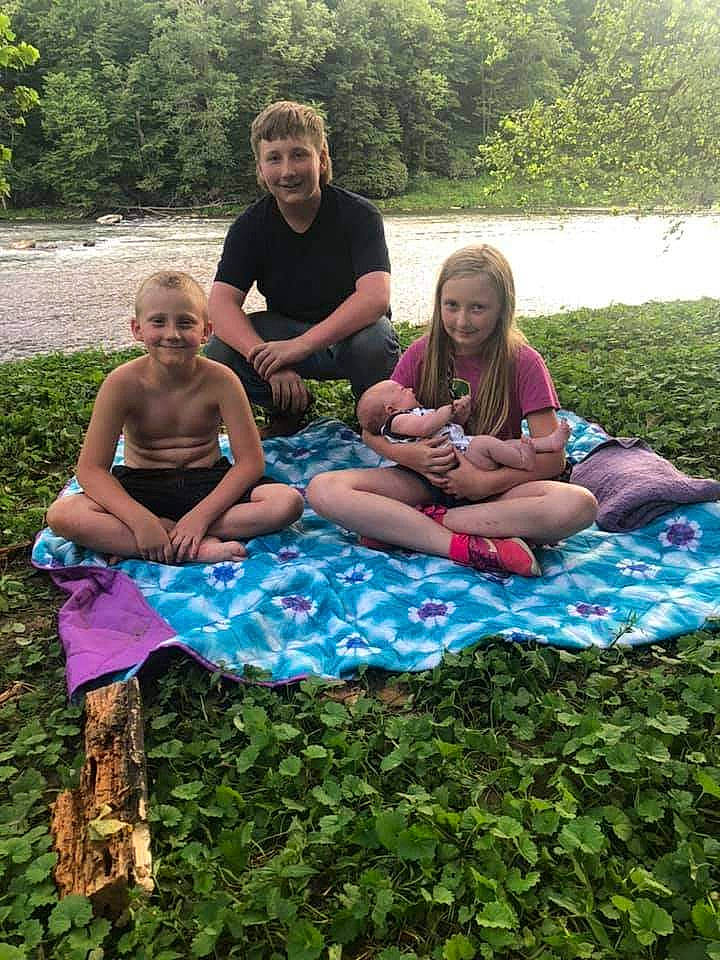 Sara joined the competition — help win amazing prizes! botany, child, event, family, fun, grass, joy, leisure, people, person, picnic, plant, recreation, sitting, summer, table, tree, vacation