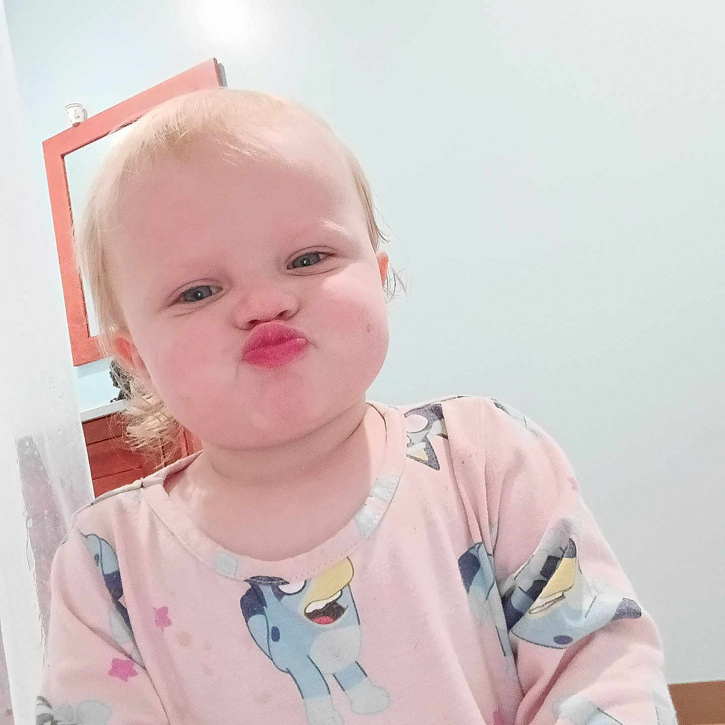 Jenasys joined the competition — help win amazing prizes! blond_hair, blue_eyes, cartoon_print, child, clothing, cute, expression, face, floor, funny_face, home, indoor, long_sleeves, mirror, pajamas, person, pout, standing, toddler, wall
