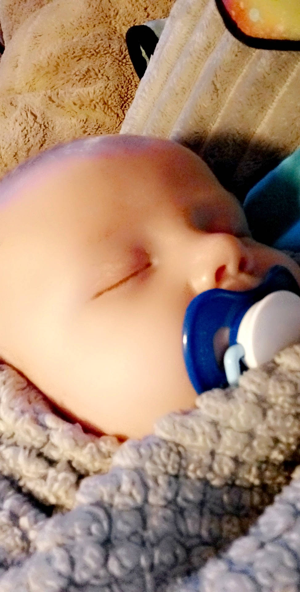 Axel is registered to the contest to win money with this photo: baby, baby_sleeping, baby_toddler_clothing, blue, cheek, child, comfort, eye, eyelash, finger, hand, iris, lip, mammal, mouth, nose, person, skin, textile, toddler