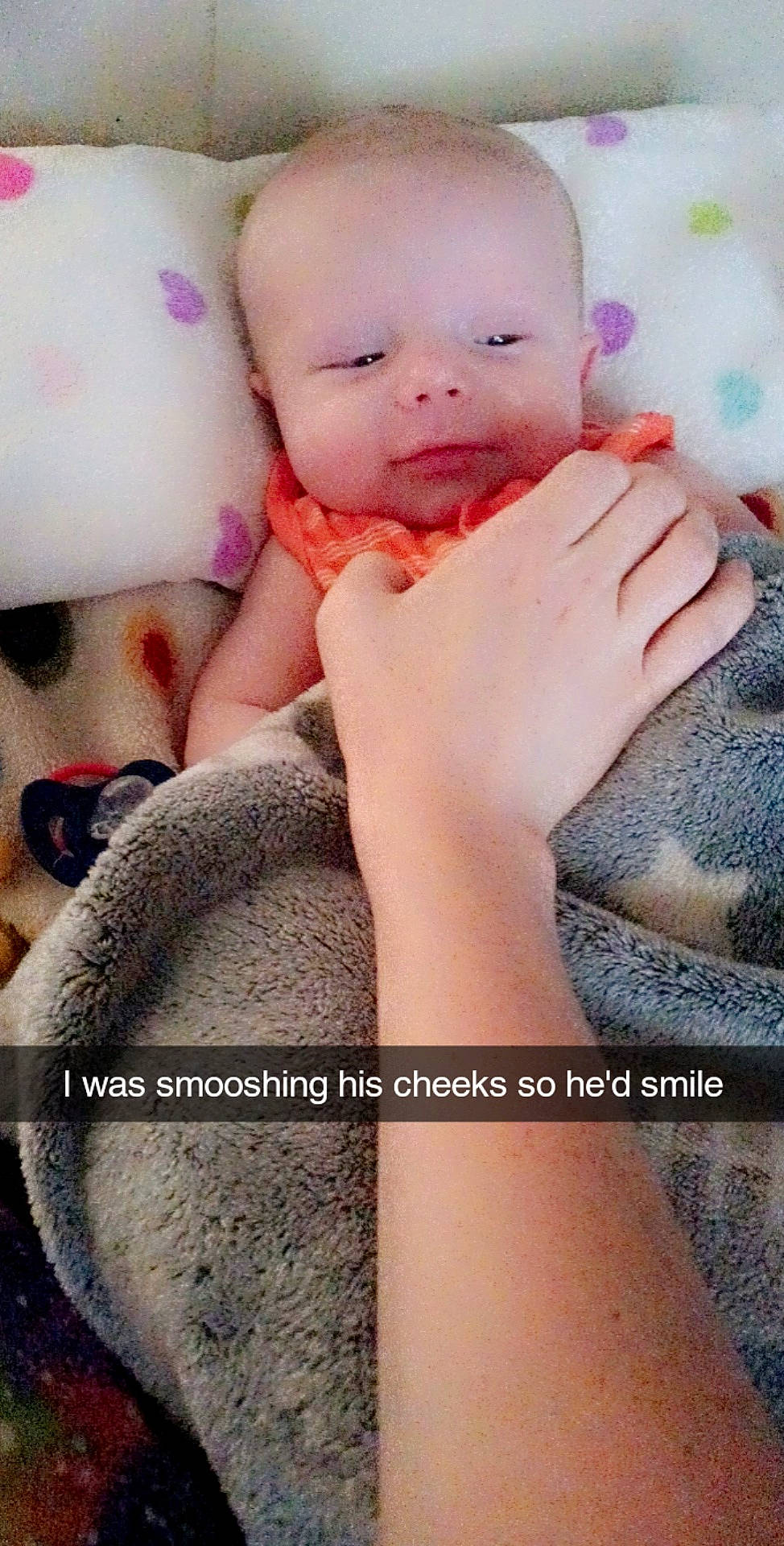 Axel is registered to the contest to win money with this photo: arm, baby, baby_toddler_clothing, finger, gesture, hand, happy, head, human_body, lip, mouth, muscle, nail, nose, organ, person, pink, skin, textile, thumb