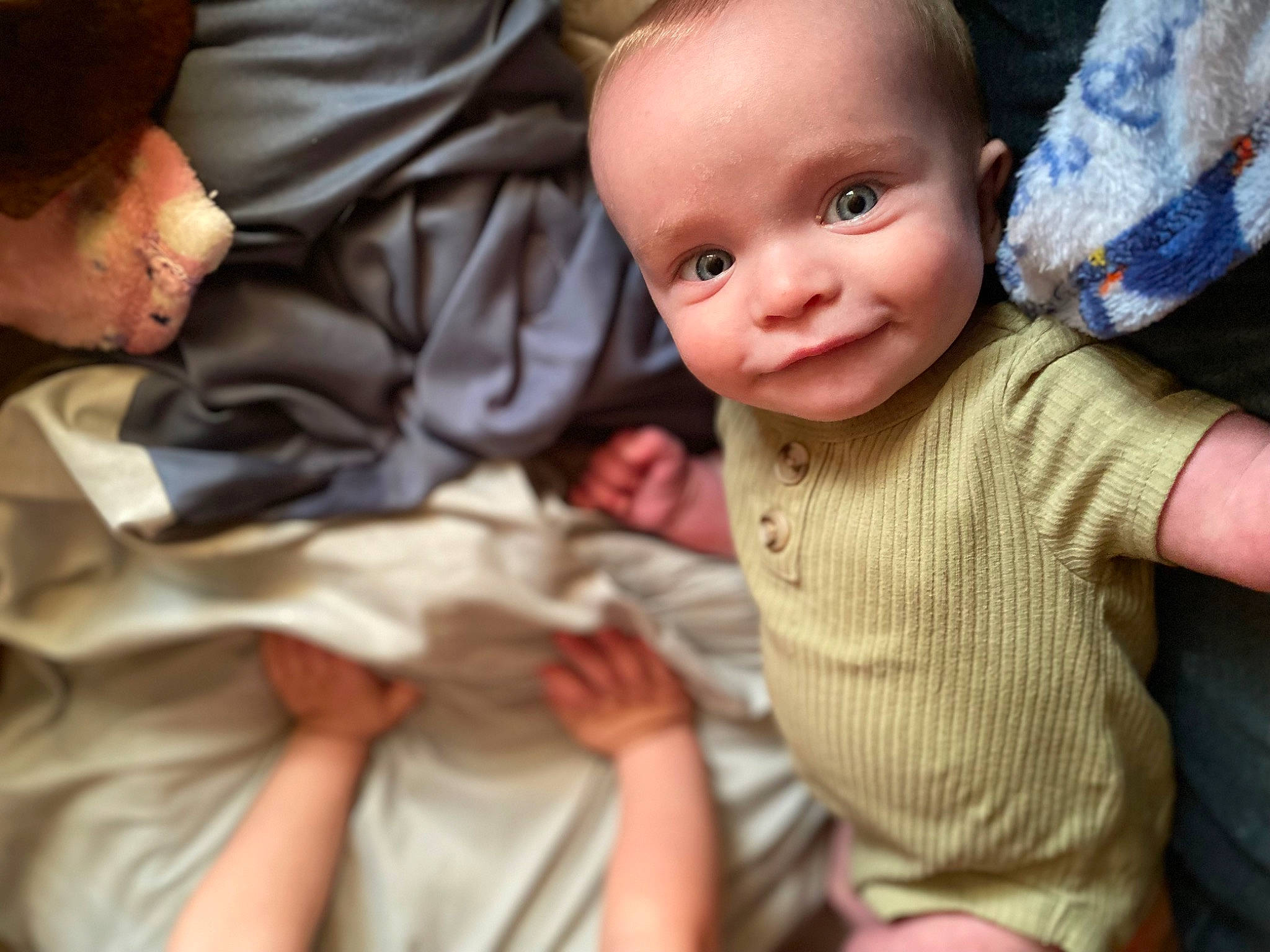 Waylon joined the competition — help win amazing prizes! baby, baby_products, baby_toddler_clothing, cheek, child, comfort, event, eye, fun, gesture, happy, human_body, mouth, nose, person, room, sitting, skin, smile, thumb