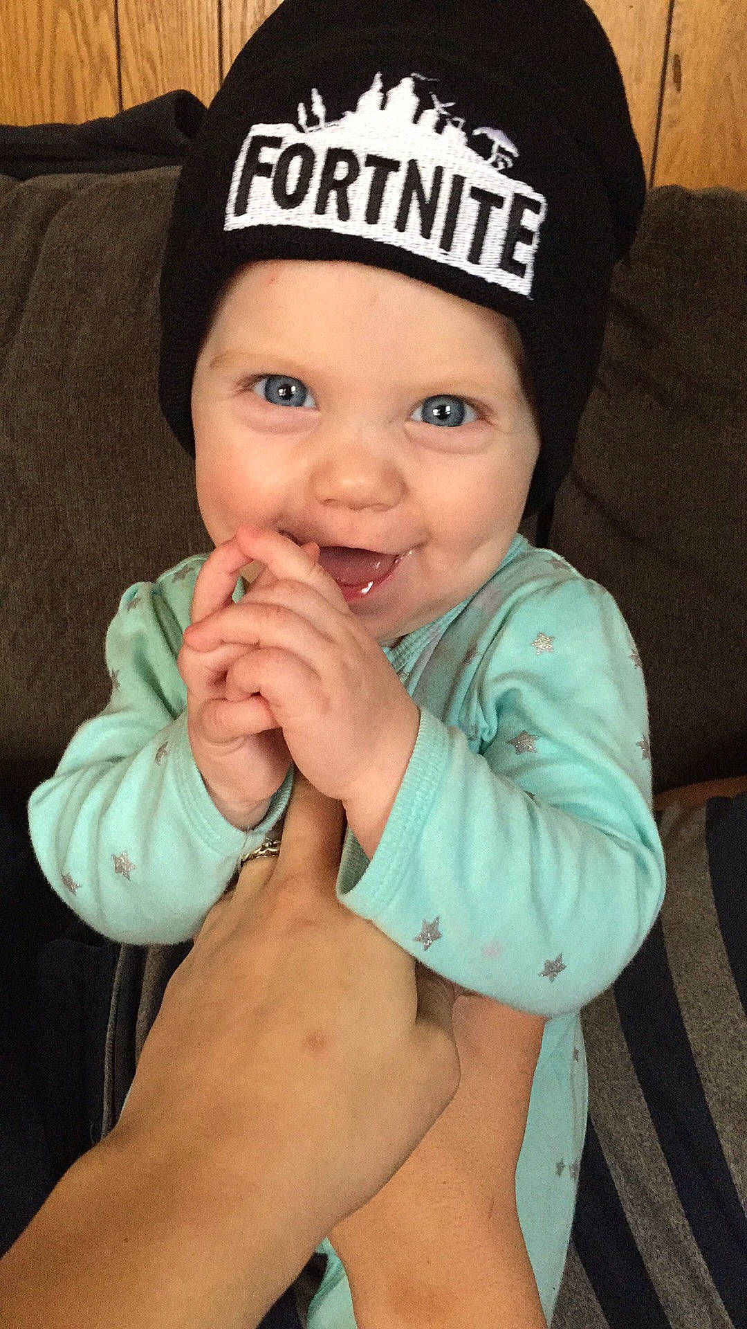 Kendra is registered to the contest to win money with this photo: arm, beanie, cap, cheek, child, cool, day, finger, girl, hand, hat, headgear, headwear, knit_cap, mouth, neck, nose, person, product, skin