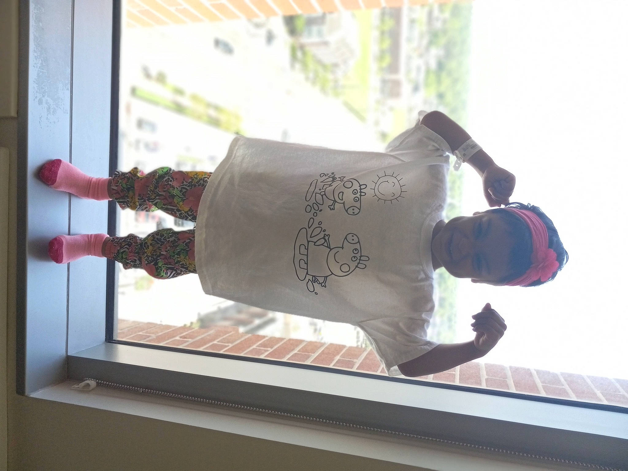 Nevaeh is registered to the contest to win money with this photo: carmine, font, gesture, glass, hat, metal, pattern, person, rectangle, room, sleeve, tree, visual_arts, window, wood, wrist