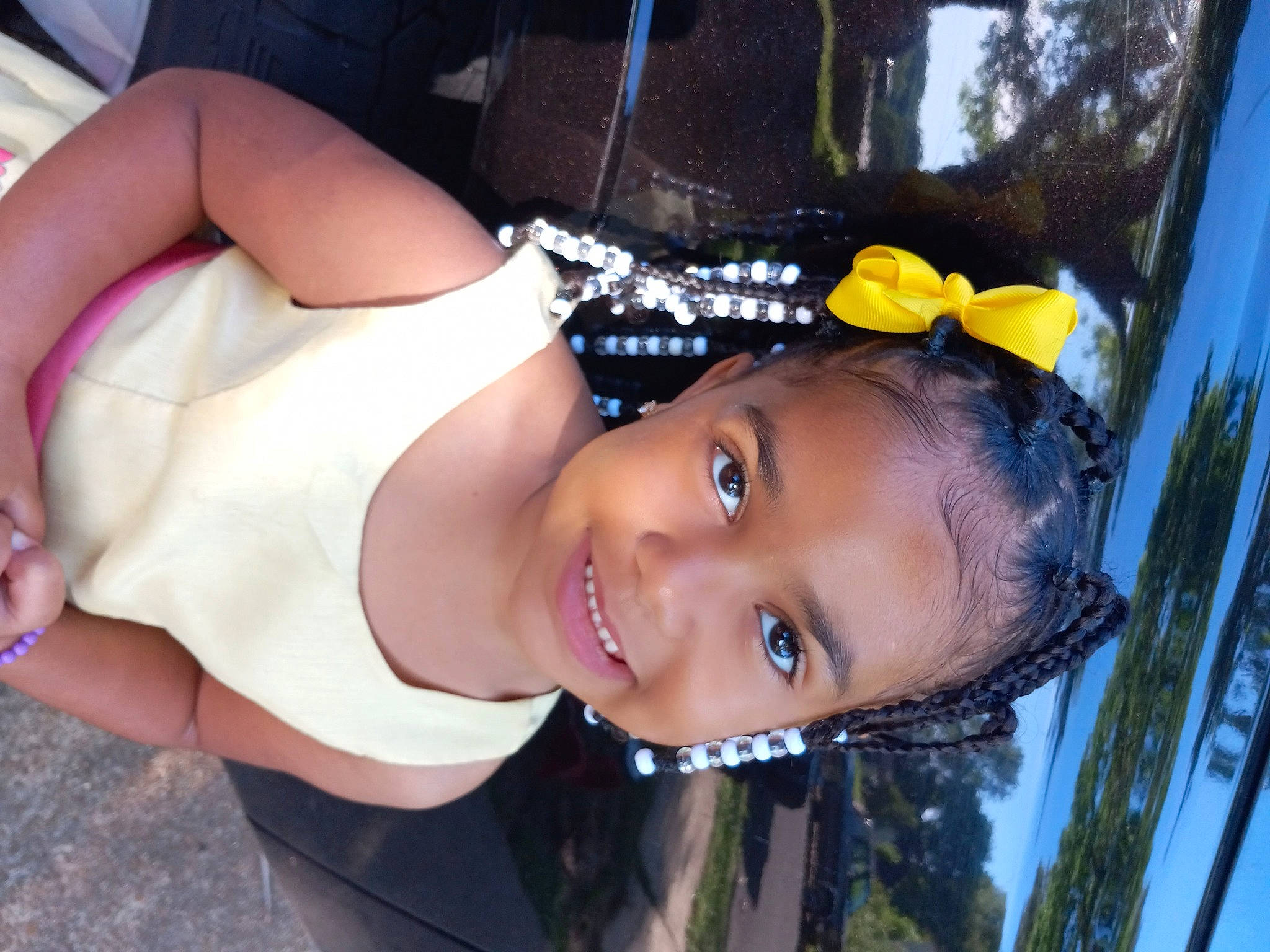 Jamiya is registered to the contest to win money with this photo: black_hair, chest, child, dress, electric_blue, fashion_accessory, flash_photography, fun, grass, happy, hat, joy, laugh, leisure, lip, mouth, person, portrait_photography, smile, toddler