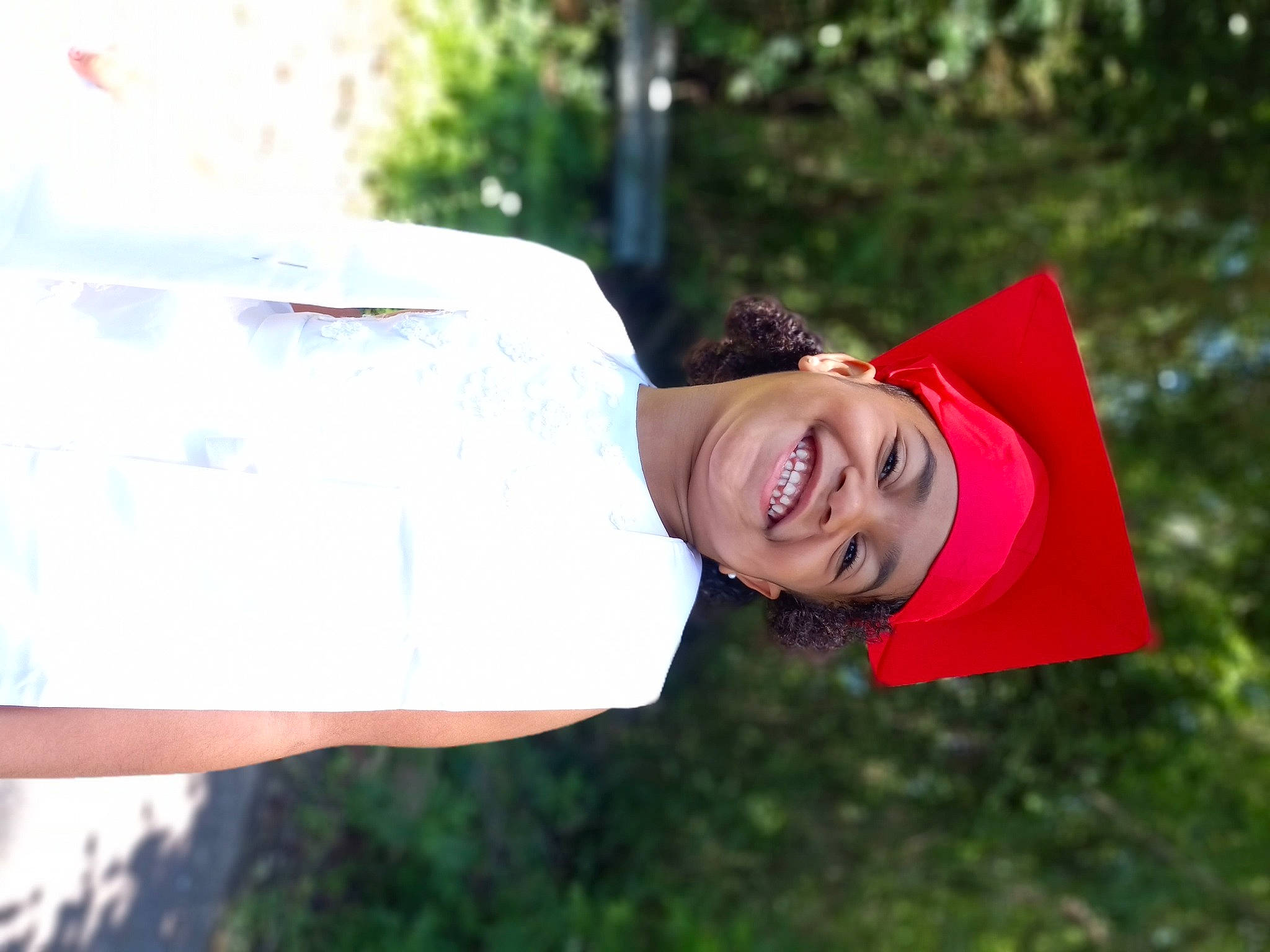 Jamiya joined the competition — help win amazing prizes! carmine, child, eyewear, fashion_accessory, fun, grass, happy, headwear, joy, laugh, leisure, magenta, people_in_nature, person, plant, portrait_photography, recreation, sitting, smile, sunglasses