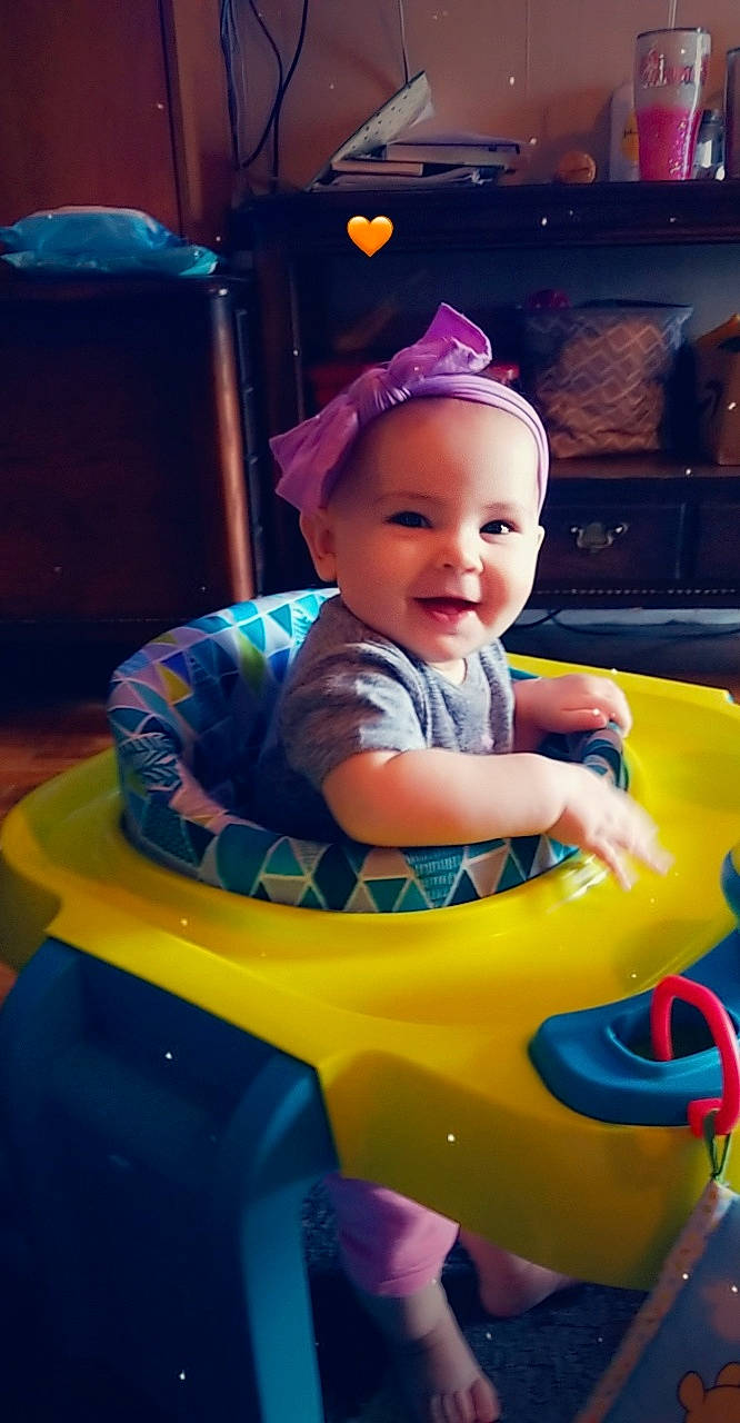 Kennadee joined the competition — help win amazing prizes! baby, baby_products, child, fun, leisure, person, play, product, recreation, sitting, skin, smile, toddler, toy, yellow