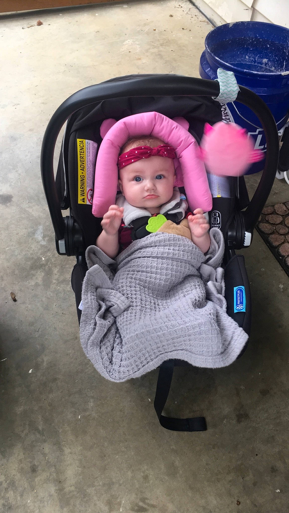 Delilah is registered to the contest to win money with this photo: baby, baby_carriage, baby_products, baby_safety, baby_toddler_clothing, bag, car_seat, child, comfort, fun, headwear, leisure, magenta, person, personal_protective_equipment, pink, product, purple, recreation, sitting