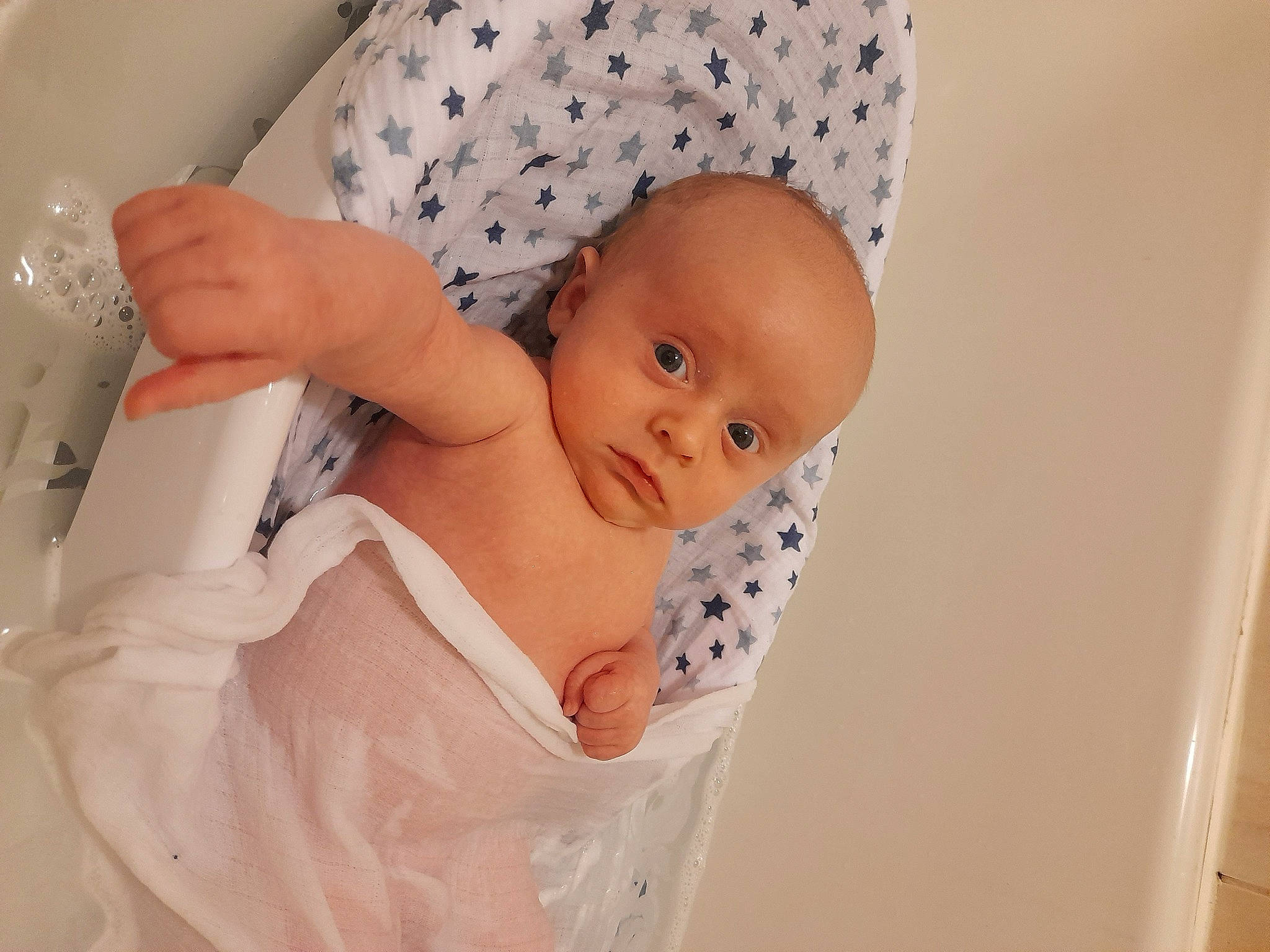 Freddie Jay is registered to the contest to win money with this photo: abdomen, baby, baby_products, baby_safety, baby_sleeping, baby_toddler_clothing, chest, child, comfort, eye, finger, human_body, linens, nail, pattern, person, skin, sleeve, stomach, thumb