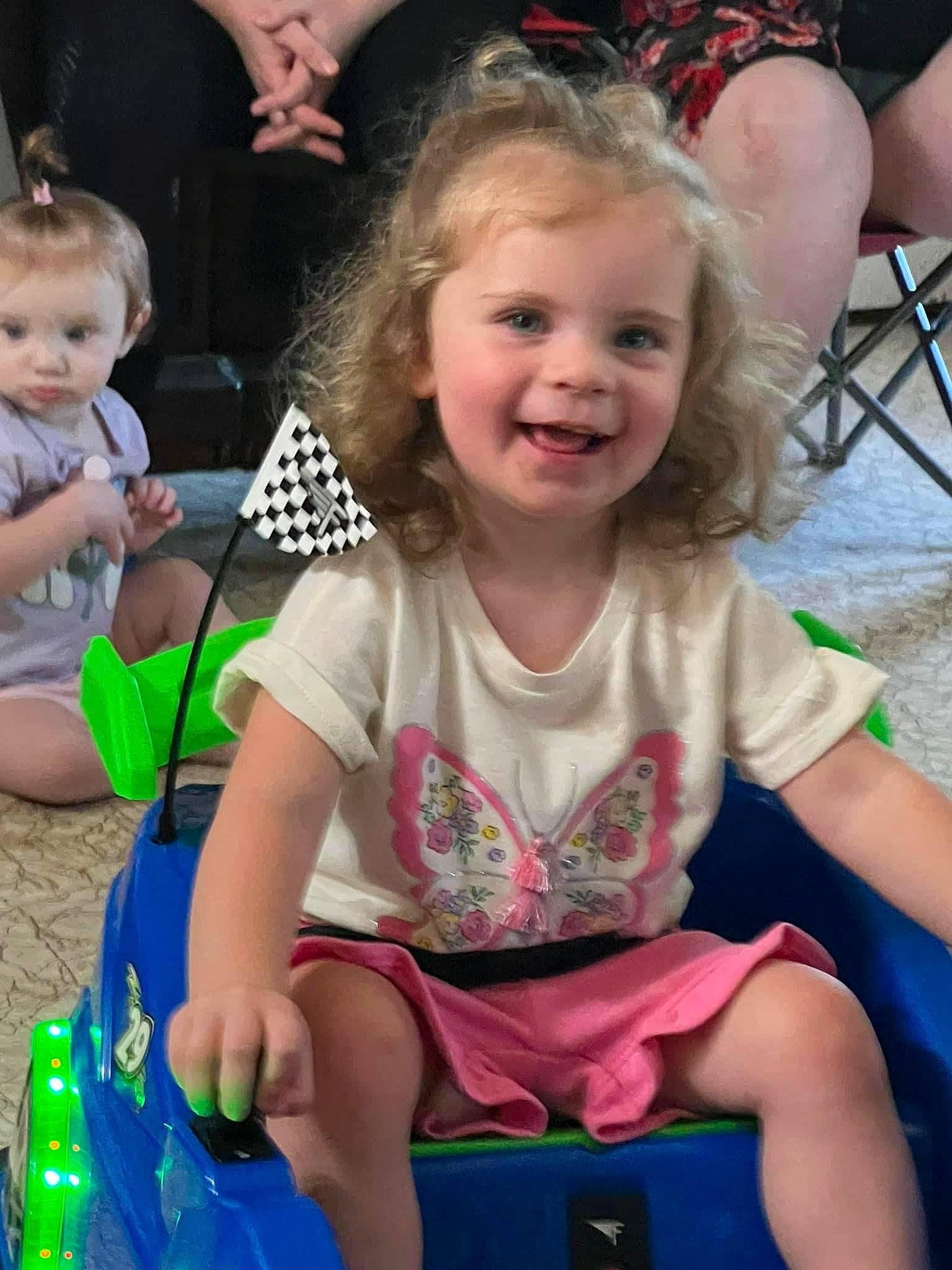 Emily is registered to the contest to win money with this photo: chair, child, clothing, eye, facial_expression, fun, hair, hairstyle, happy, head, iris, joy, leisure, organ, person, photograph, pink, skin, smile, summer