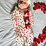 Evie joined the competition — help win amazing prizes! adorable, baby, blanket, child, cute, headwrap, heart_shape, hearts, indoor, infant, lying_down, newborn, onesie, pacifier, portrait, red_bows, rose_petals, sleepwear, soft_lighting, winnie_the_pooh