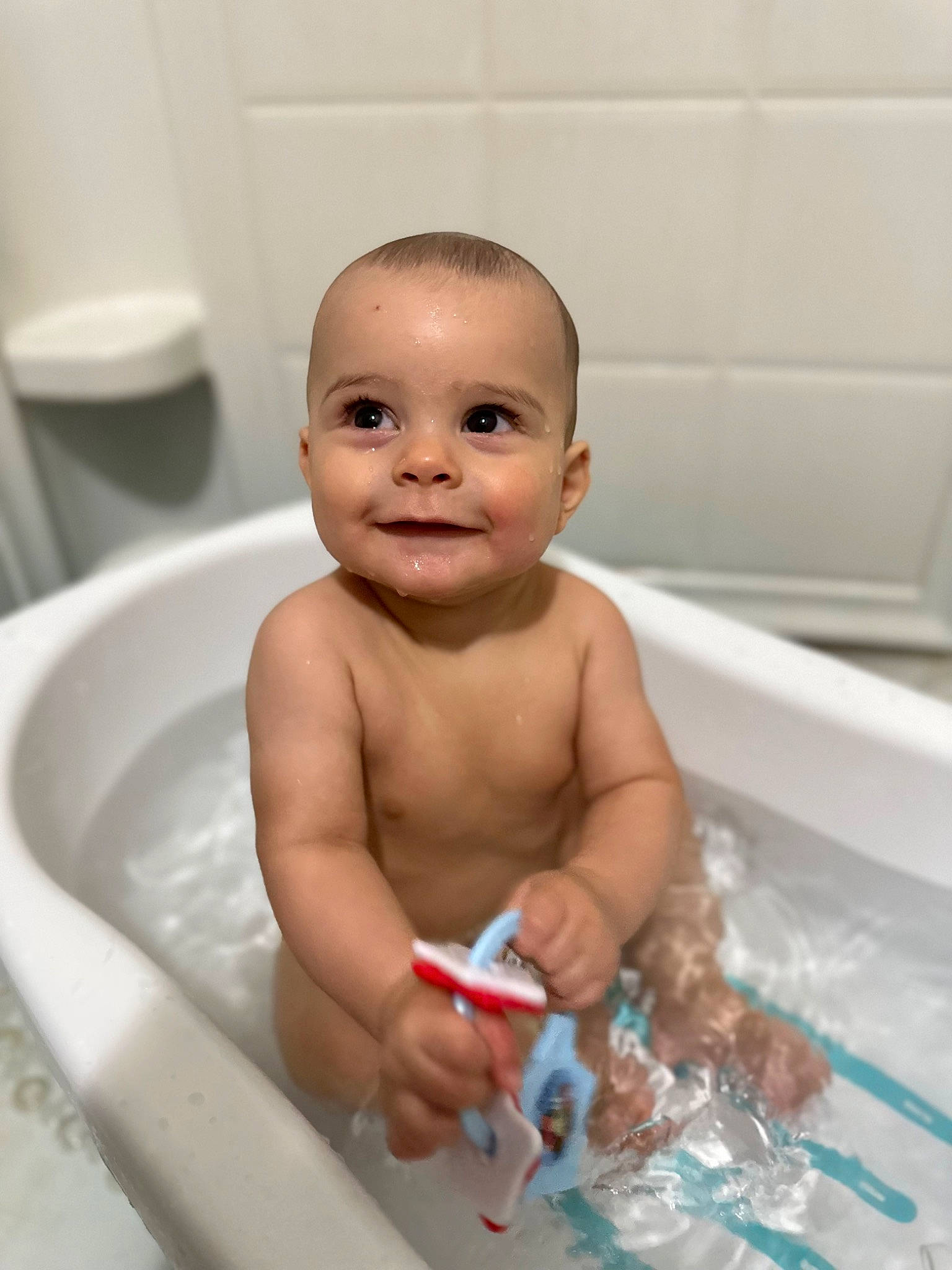 Maximo joined the competition — help win amazing prizes! baby, baby_bathing, bath_toy, bathing, bathroom, bathtub, chest, child, composite_material, fluid, fun, happy, joy, liquid, person, personal_care, plumbing, plumbing_fixture, smile, thumb