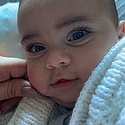 Angus joined the competition — help win amazing prizes! baby, infant, face, close_up, blanket, knitted, hand, manicure, soft_lighting, cute, child, portrait, young, skin, eyelashes, cozy, sleepy, warm, toddler, expression