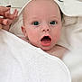 baby, towel, hand, blue_eyes, skin, face, expression, infant, cute, surprised, person, child, newborn, napkin, soft, blanket, fingers, closeup, portrait, indoor