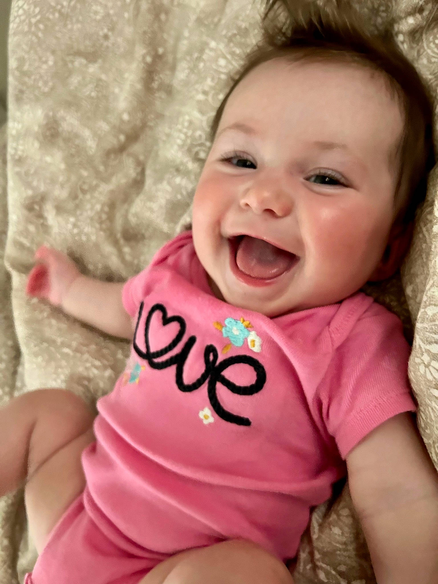 Maria joined the competition — help win amazing prizes! baby, baby_toddler_clothing, cheek, comfort, finger, gesture, happy, human_body, lip, mouth, neck, nose, person, pink, product, skin, sleeve, smile, textile, thigh