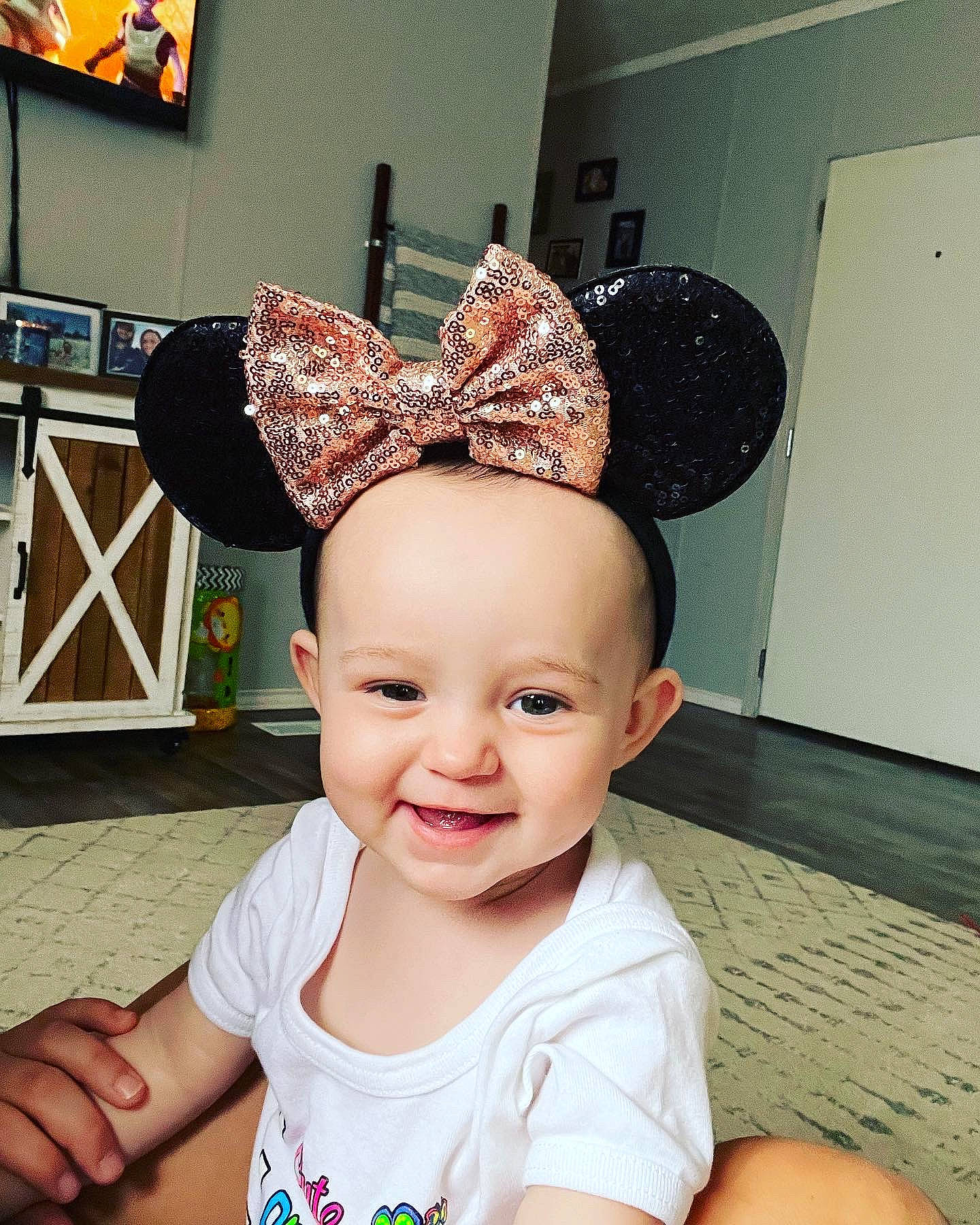 Adalynn joined the competition — help win amazing prizes! baby, baby_toddler_clothing, cap, costume_hat, ear, fashion_accessory, flooring, fun, hair_accessory, happy, headband, headgear, headpiece, joy, mammal, party_supply, person, sleeve, smile, snapshot