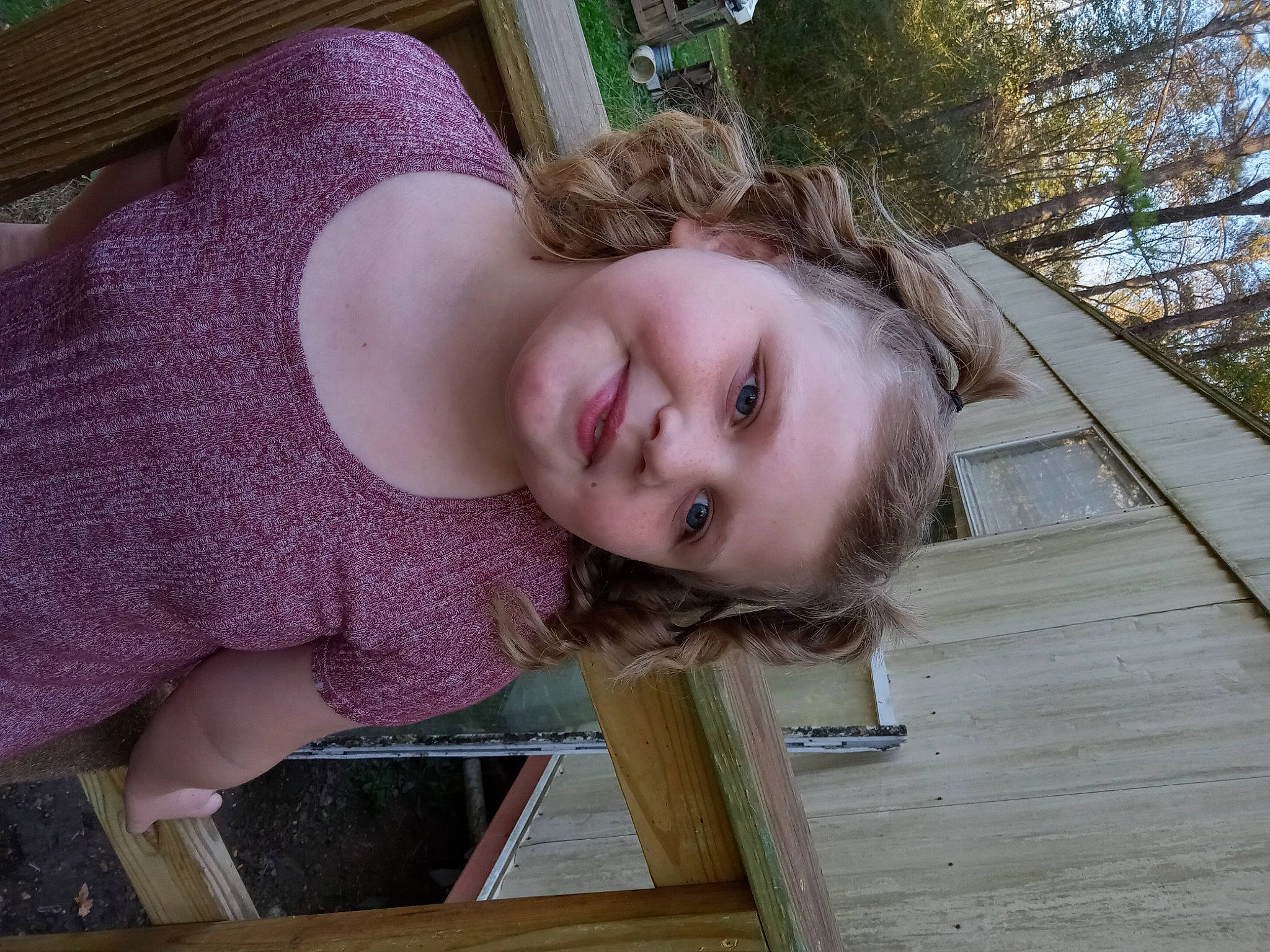 Lona is registered to the contest to win money with this photo: brown_hair, child, fun, grass, happy, hardwood, joy, leisure, lip, long_hair, magenta, mammal, pattern, person, pink, plant, portrait_photography, sitting, smile, tree