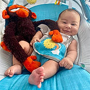 Wyatt is registered to the contest to win money with this photo: baby, bed, blanket, crib, cushion, doll, face, furniture, head, homedecor, infantbed, newborn, person, photography, portrait, toy