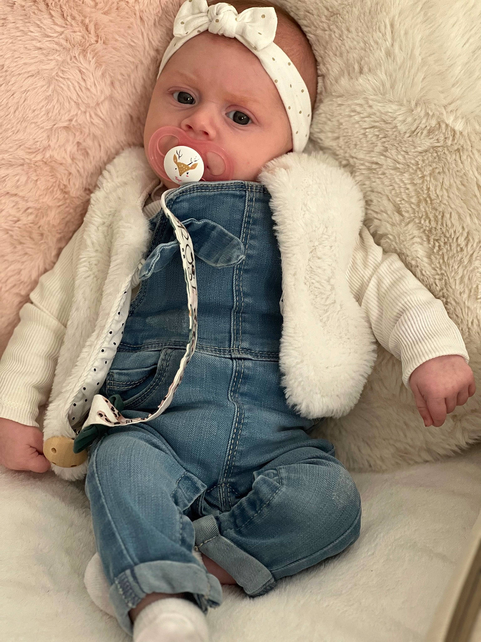 Rose participe au concours pour gagner de l'argent avec cette photo : baby, baby_toddler_clothing, cap, cheek, chin, comfort, doll, eye, fur, fur_clothing, headwear, jacket, knit_cap, lip, nose, person, skin, sleeve, textile, toddler