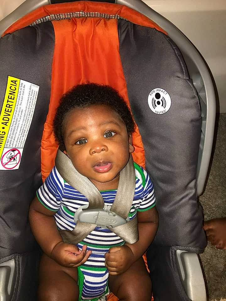 Chancellor Jordan joined the competition — help win amazing prizes! arm, baby_toddler_clothing, black_hair, chair, cheek, child, chin, comfort, cool, eye, fun, hairstyle, happy, human, person, product, sitting, skin, sleeve, t_shirt