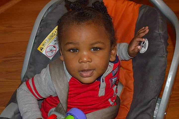 Chancellor Jordan joined the competition — help win amazing prizes! audio_equipment, baby, cheek, child, ear, eyelash, forehead, fun, hair, happy, iris, nose, organ, person, room, sitting, skin, smile, t_shirt, thumb