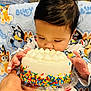 Sneijder joined the competition — help win amazing prizes! baby, blanket, cake, cartoon_characters, celebration, child, closeup, cute, face, food, frosting, hand, happy, holding, indoor, pajamas, person, sitting, sprinkles, sweet