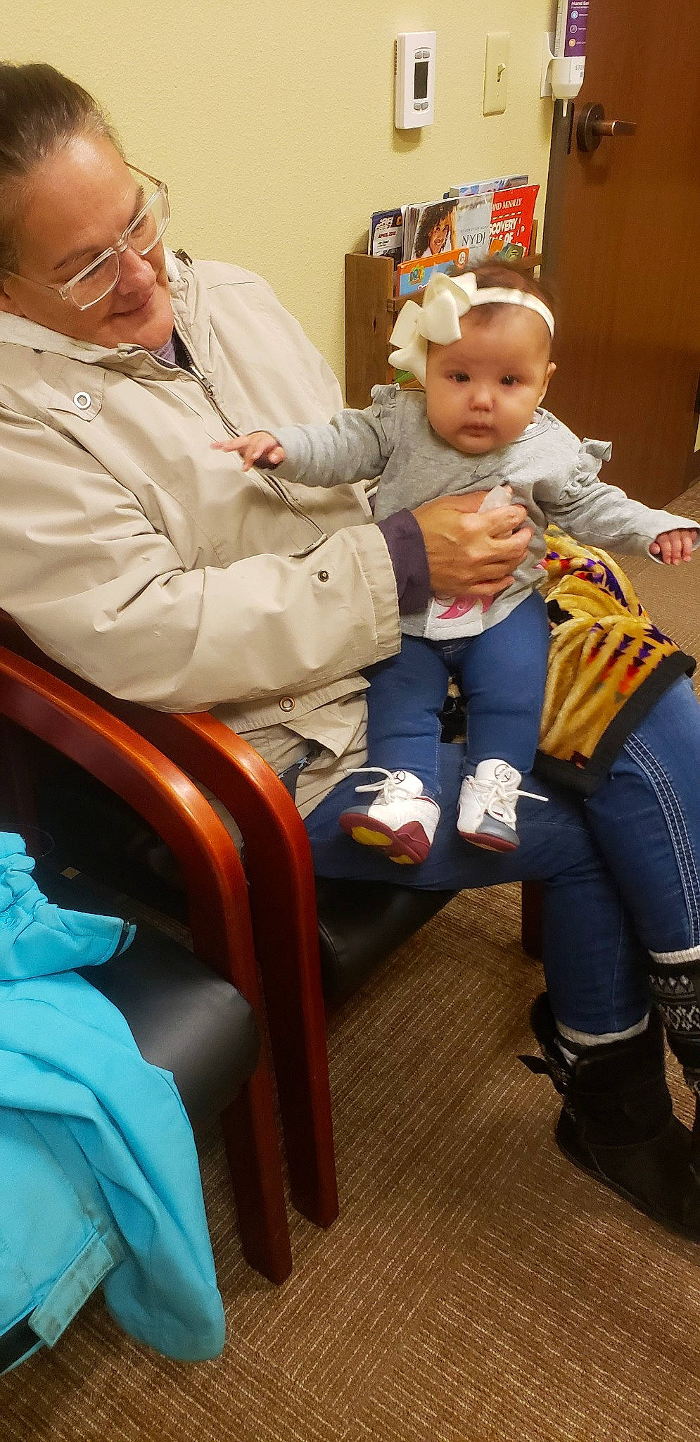 Patricia is registered to the contest to win money with this photo: child, day, fun, furniture, girl, grandparent, human_behavior, infant, leg, people, person, play, product, senior_citizen, sitting, skin, standing, toddler