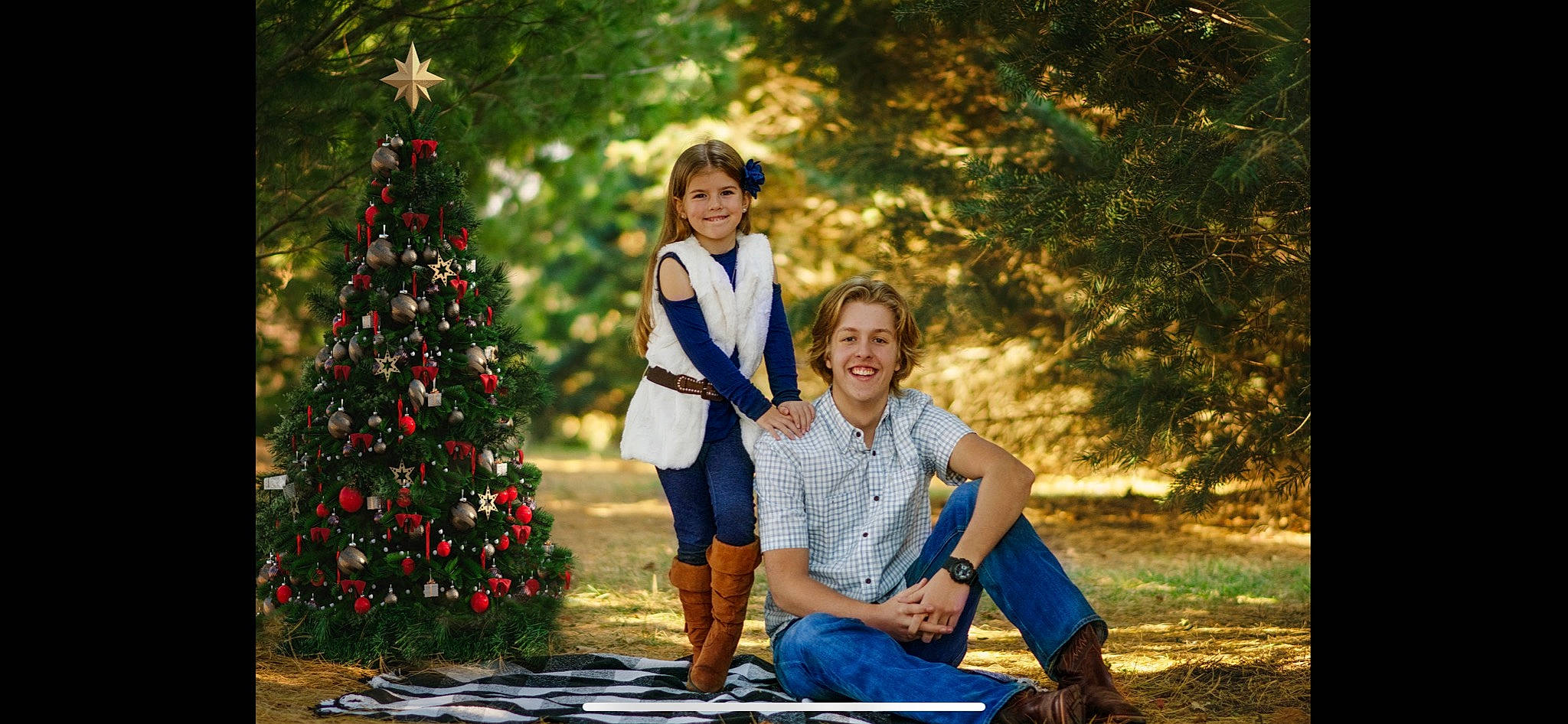 Liberty is registered to the contest to win money with this photo: beauty, christmas_ornament, christmas_tree, electric_blue, event, flash_photography, fun, grass, happy, joy, leaf, leisure, nature, ornament, people_in_nature, person, photograph, plant, smile, travel