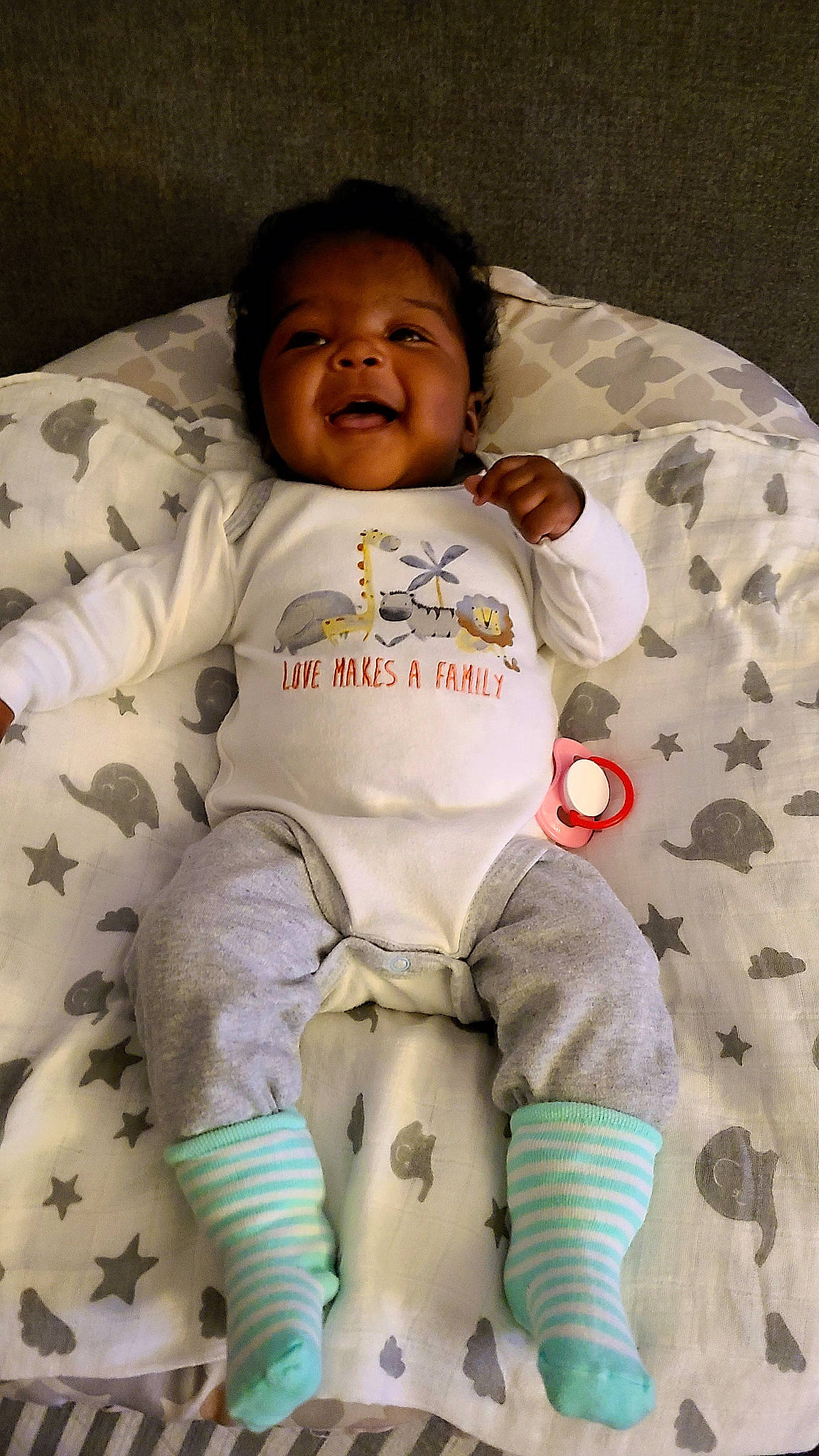 Honey is registered to the contest to win money with this photo: arm, baby, baby_safety, baby_sleeping, baby_toddler_clothing, cheek, child, comfort, finger, happy, linens, mammal, outerwear, person, pink, skin, sleeve, smile, textile, toddler