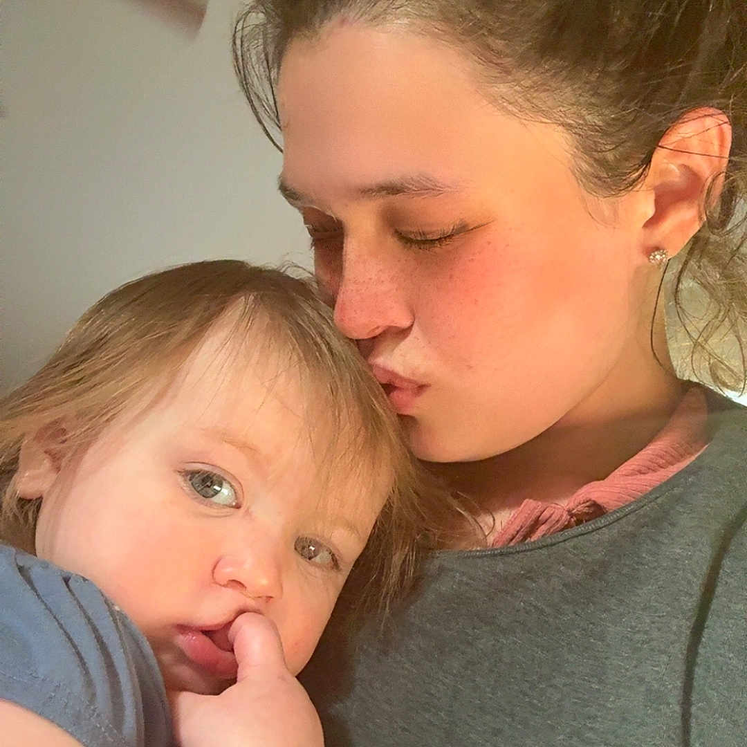 Paisley Rae joined the competition — help win amazing prizes! mother, baby, child, kiss, affection, love, portrait, indoor, closeup, skin, hair, face, expression, toddler, candid, warm_light, casual_clothing, family, intimacy, comfort