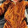 Paisley Rae joined the competition — help win amazing prizes! baby, child, onesie, brown, fuzzy, hood, face, eyes, infant, clothing, cute, portrait, soft, warm, blanket, lying_down, young, adorable, costume, animal_ears