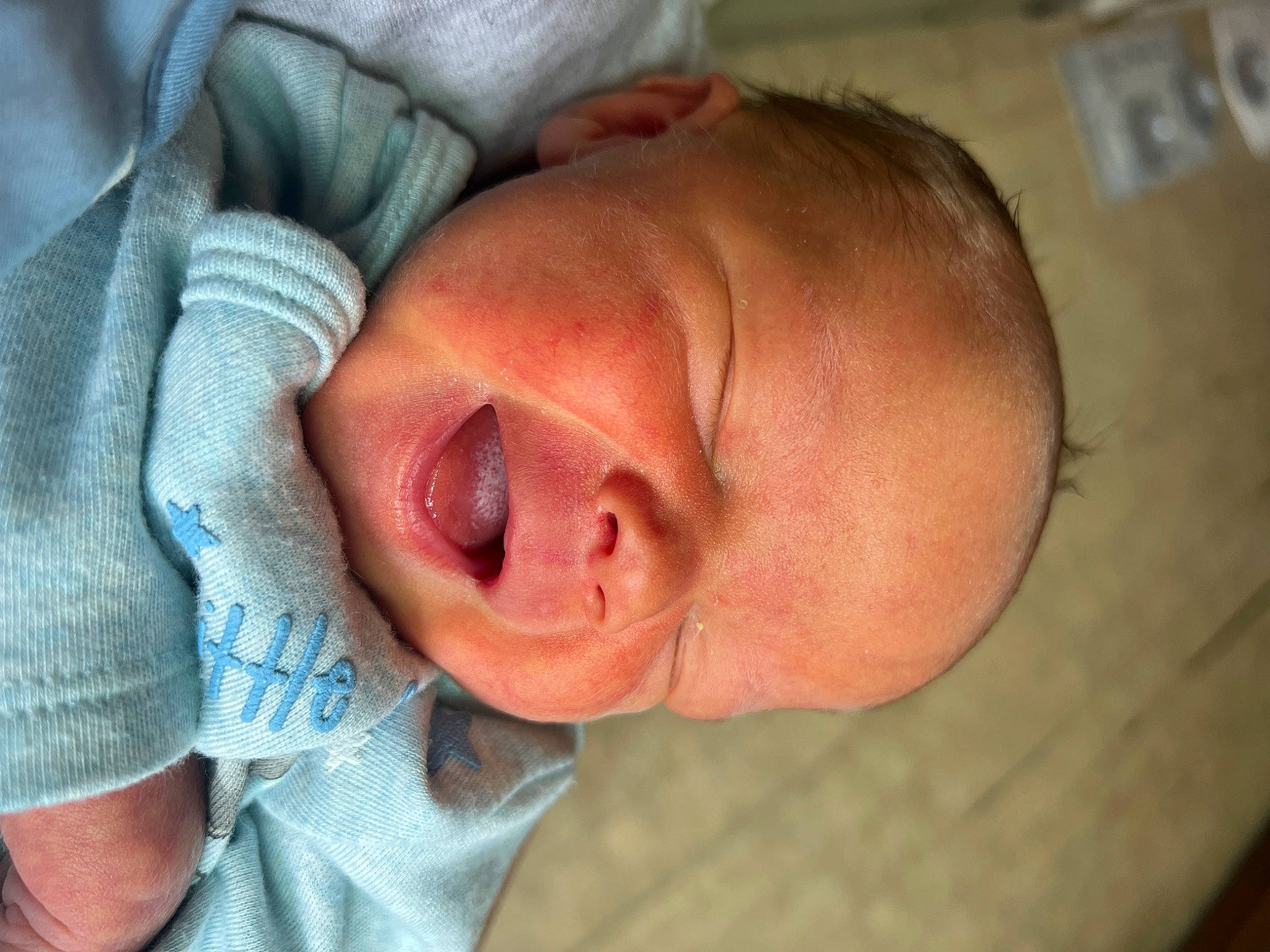 Warren is registered to the contest to win money with this photo: baby, cheek, chin, comfort, ear, eyebrow, facial_expression, finger, forehead, headgear, iris, lip, mammal, mouth, neck, nose, person, skin, textile, toddler