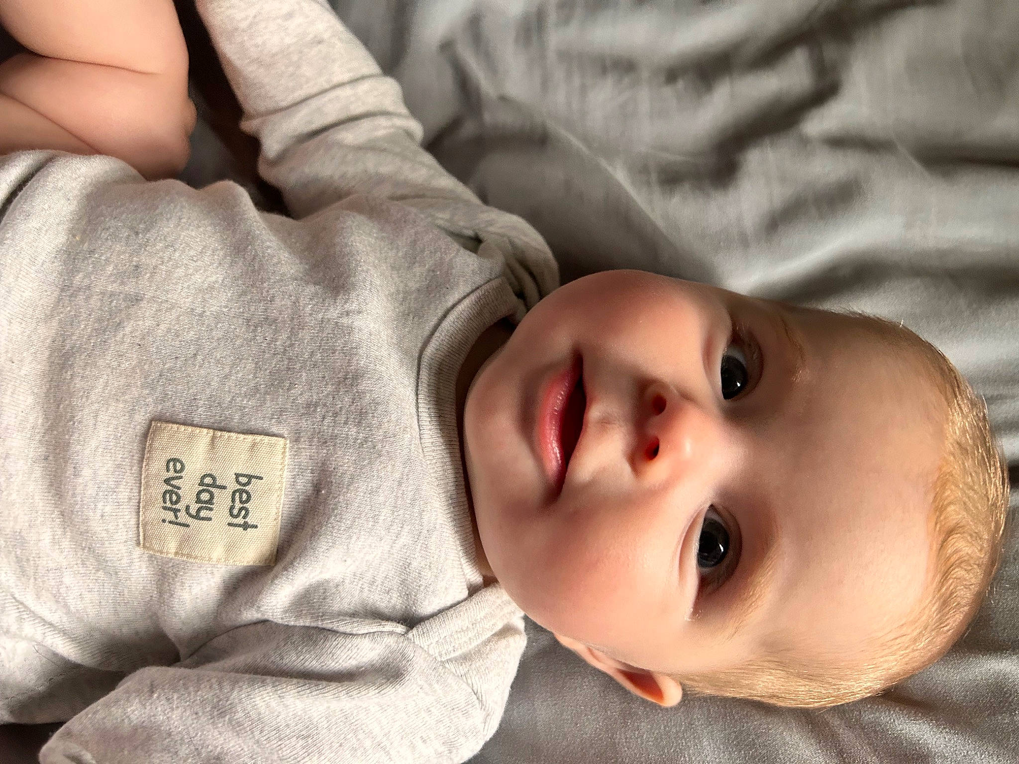 Hadlee joined the competition — help win amazing prizes! baby, baby_toddler_clothing, cheek, child, comfort, eyelash, flash_photography, fur, gesture, grass, happy, nose, person, portrait_photography, skin, sleeve, thumb, toddler, wood