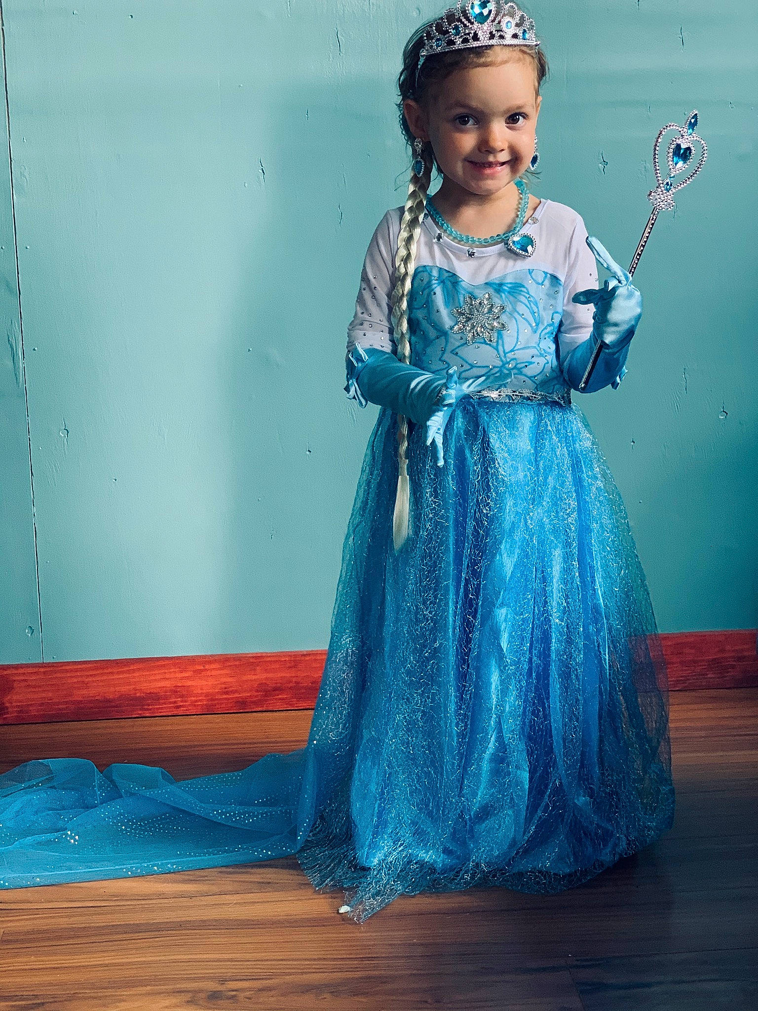 Trinity joined the competition — help win amazing prizes! aqua, blue, child, child_model, clothing, dress, fashion_design, formal_wear, gown, hair_accessory, joy, neck, person, smile, tradition, turquoise