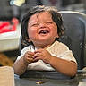 toddler, child, high_chair, food, messy, happy, laughing, indoor, meal_time, cute, smiling, baby, face, hands, table, hair, white_shirt, expression, person, seated