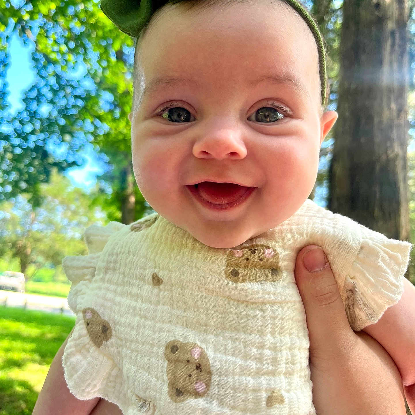 Emory joined the competition — help win amazing prizes! accessories, baby, blouse, clothing, dress, face, grass, happy, head, land, laughing, nature, outdoors, person, photography, plant, portrait, smile, tree, vegetation