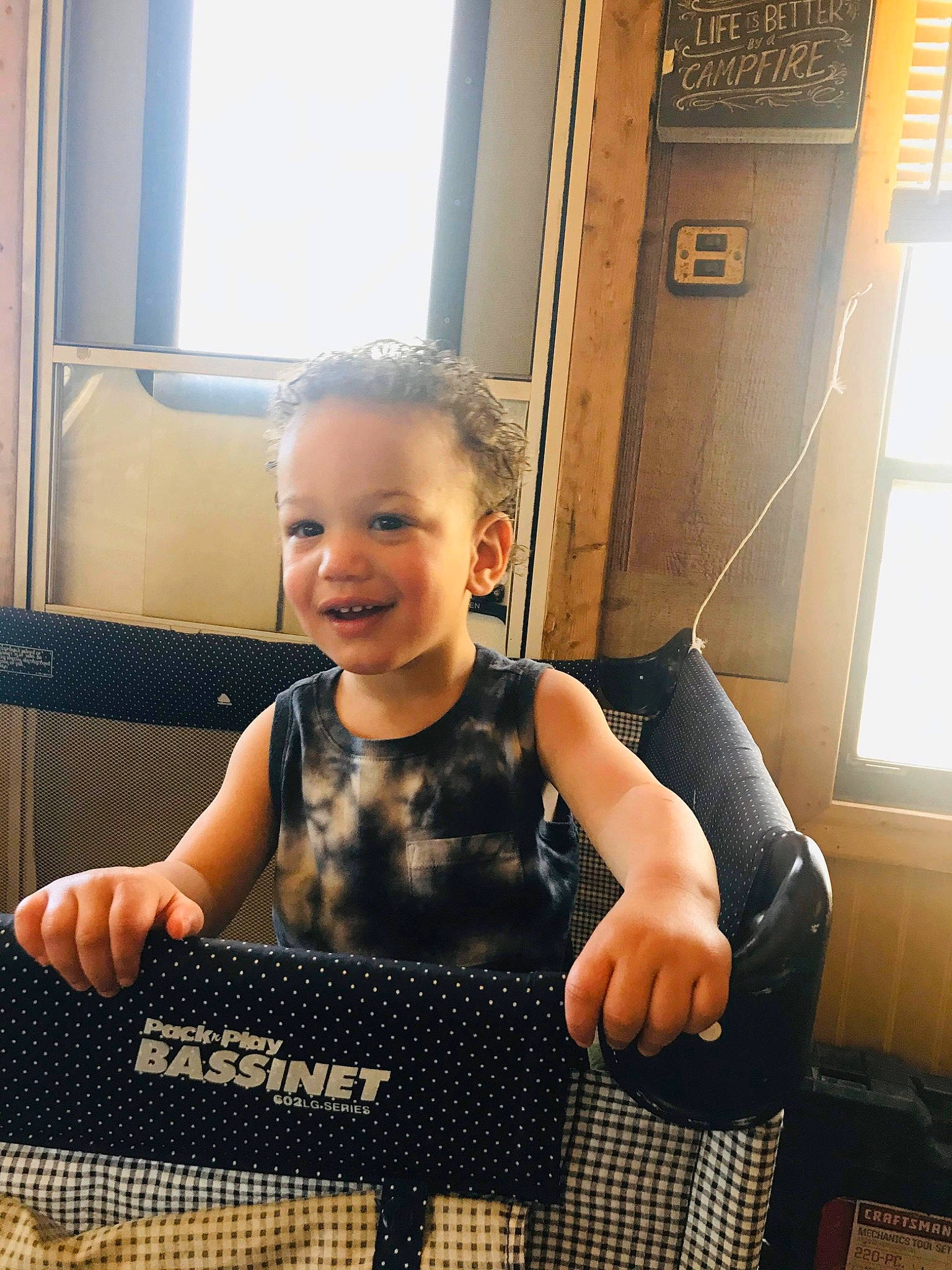 Sean is registered to the contest to win money with this photo: arm, baby, child, finger, hand, joy, person, sitting, skin, smile, thumb, toddler