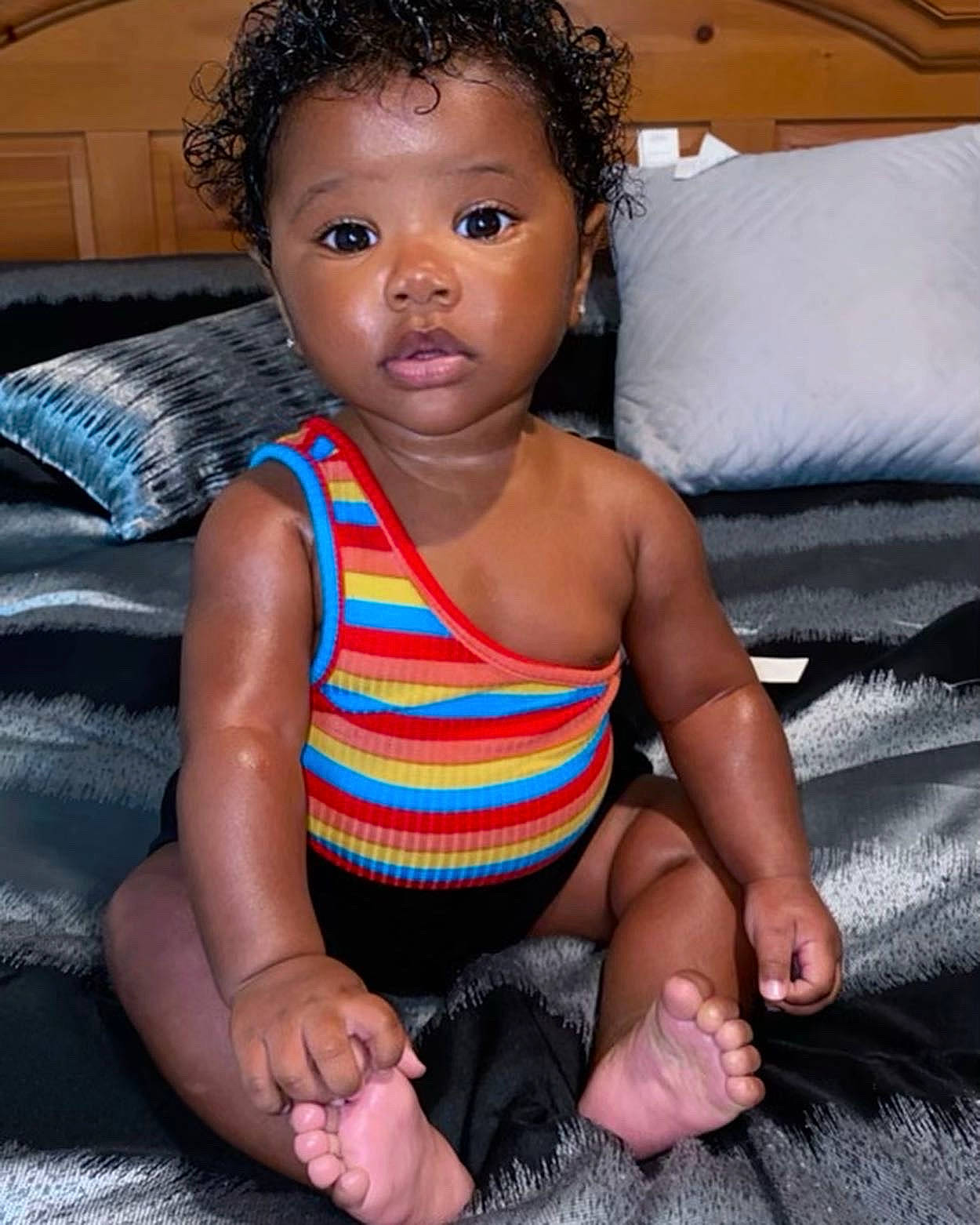 Sophia is registered to the contest to win money with this photo: baby_toddler_clothing, black, cheek, chin, eye, face, flash_photography, hair, hairstyle, head, iris, joint, leg, lip, mouth, neck, nose, organ, person, skin