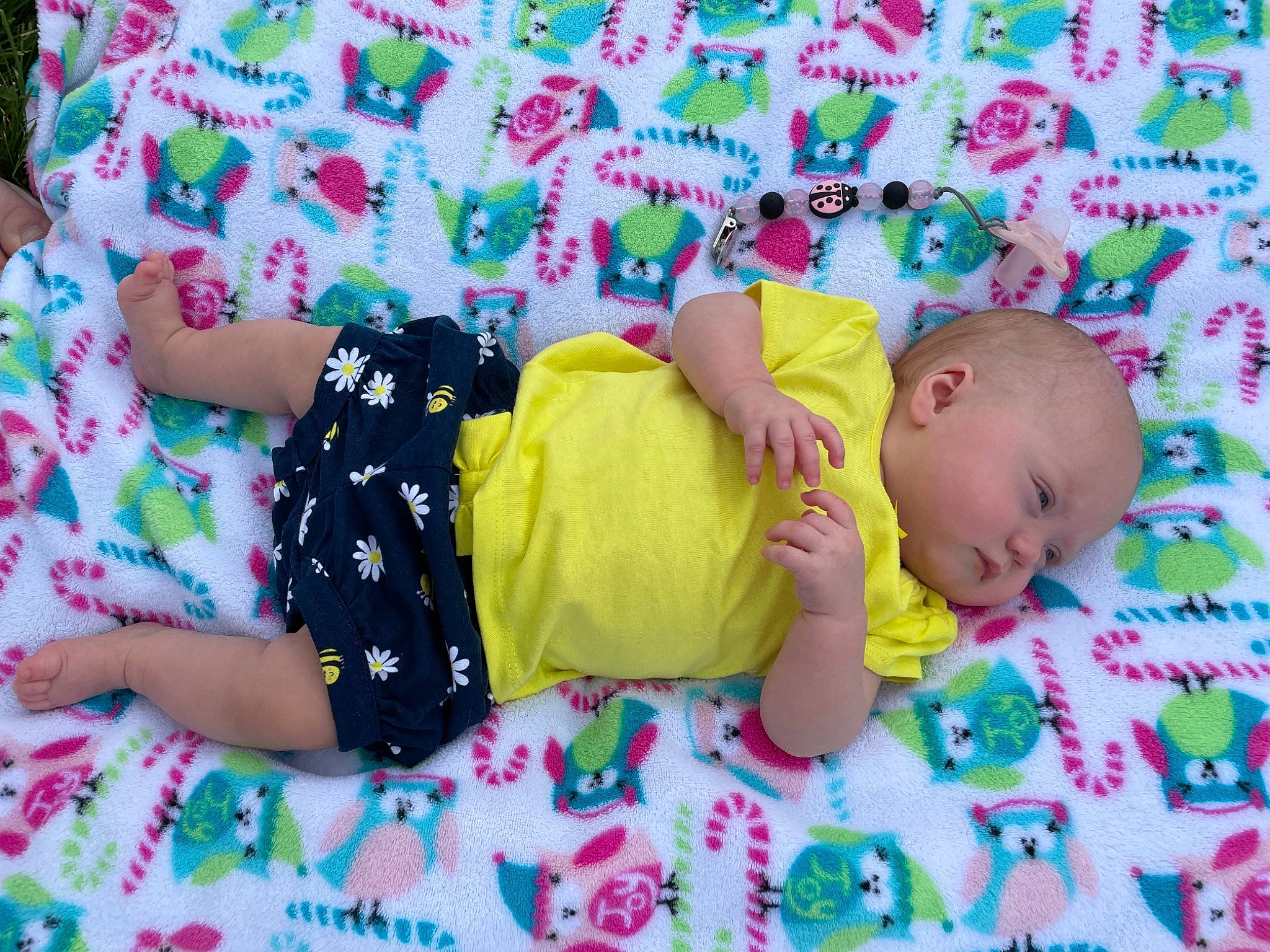 Logann joined the competition — help win amazing prizes! baby, baby_toddler_clothing, child, comfort, fun, grass, hand, happy, human_body, linens, pattern, person, pink, play, product, room, skin, sleeve, t_shirt, textile
