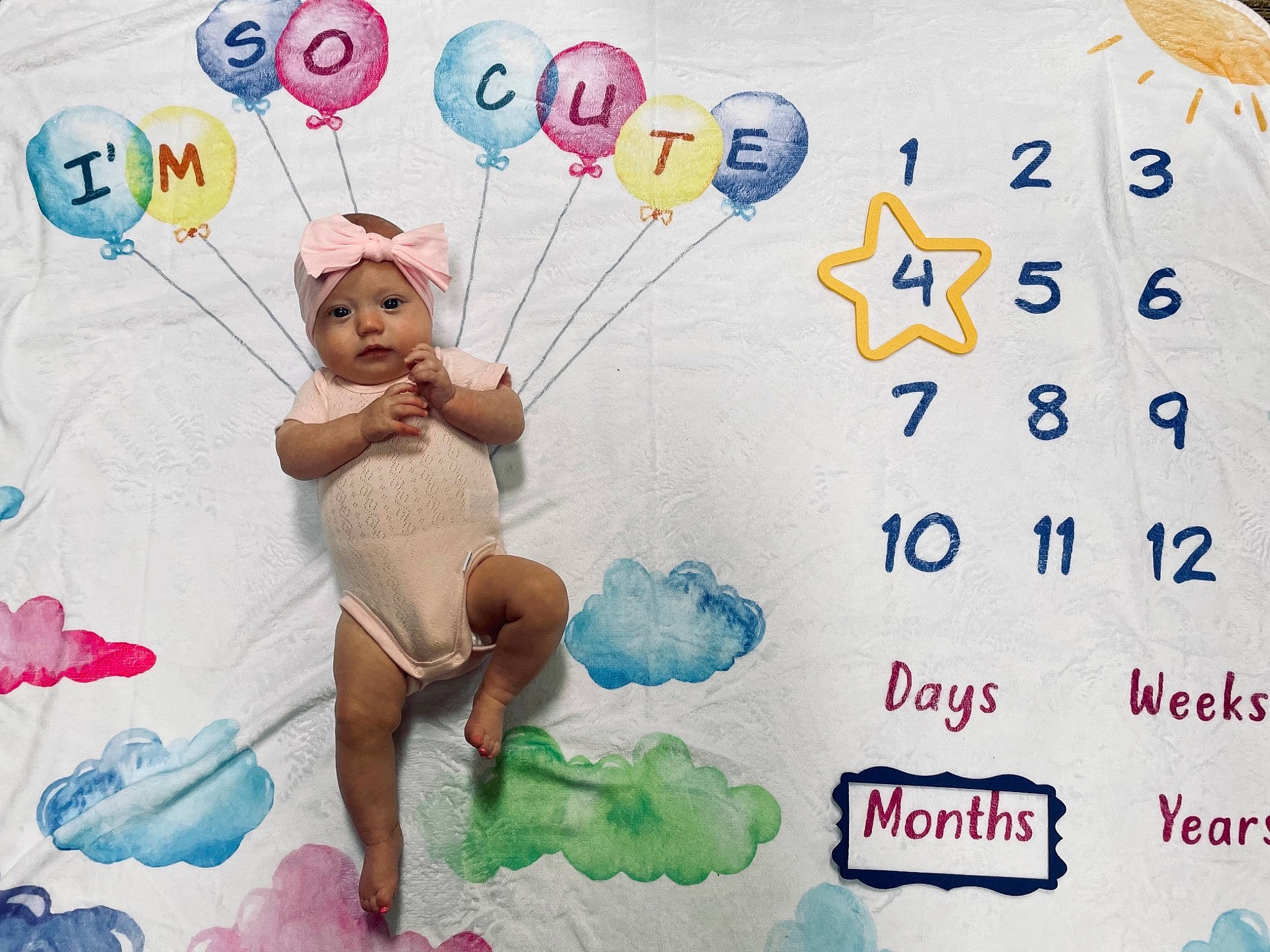 Logann is registered to the contest to win money with this photo: art, balloon, child, event, fictional_character, font, fun, gesture, graphic_design, graphics, happy, headwear, illustration, leisure, organism, party_supply, person, product, room, t_shirt