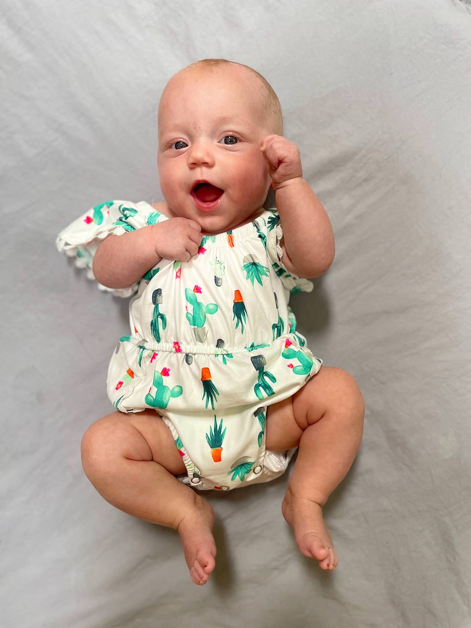 London joined the competition — help win amazing prizes! baby, baby_toddler_clothing, cheek, collar, comfort, eye, face, finger, gesture, hand, happy, head, human_body, iris, leg, person, skin, sleeve, textile, thumb