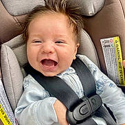 Kai joined the competition — help win amazing prizes! baby, car_seat, smiling, happy, child, infant, seatbelt, clothing, hair, face, safety, straps, closeup, cute, person, infant_clothing, car, child_safety, joy, expression