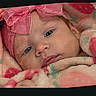 baby, infant, child, portrait, face, eyes, pink_bow, headband, blanket, wrapped, cozy, lying_down, indoors, closeup, sleepy, looking_at_camera, textile, soft_colors, photograph, cute