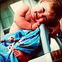 Everleigh is registered to the contest to win money with this photo: baby, child, blanket, blue_blanket, chair, cute, face, feet, foot, hair, happy, indoors, infant, person, playful, portrait, smile, toddler, wrapped, young