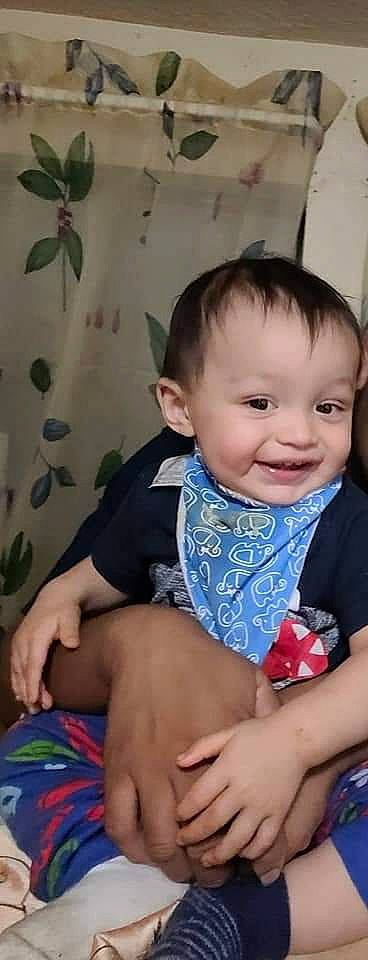 Eleazar is registered to the contest to win money with this photo: arm, baby, baby_toddler_clothing, cheek, chin, comfort, eye, facial_expression, finger, fun, hand, happy, iris, joy, neck, nose, person, skin, sleeve, smile