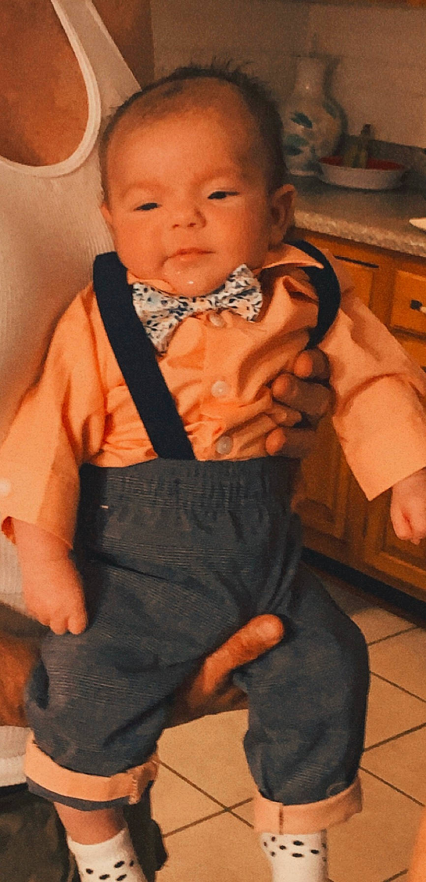 Silas is registered to the contest to win money with this photo: baby, baby_toddler_clothing, cabinetry, cheek, child, collar, comfort, dress_shirt, eye, face, finger, formal_wear, head, person, shoulder, sitting, skin, sleeve, thumb, tie