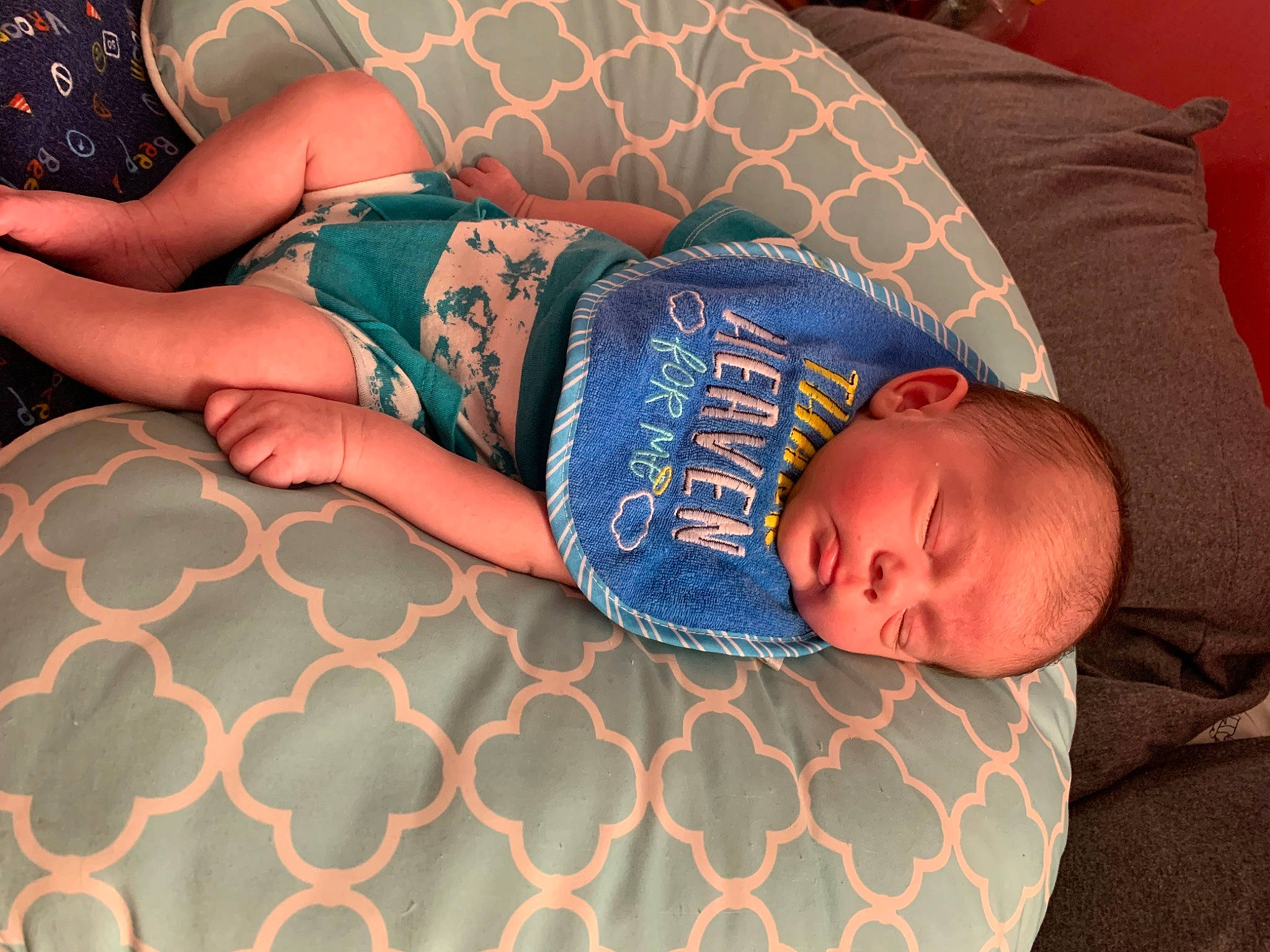 Silas is registered to the contest to win money with this photo: arm, baby, baby_toddler_clothing, beauty, blue, comfort, elbow, finger, human_body, linens, nail, orange, organ, pattern, person, skin, textile, thigh, toddler, wrist