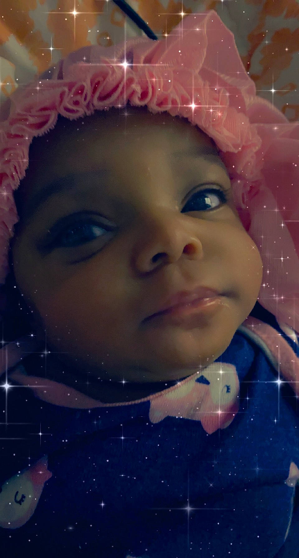 Chloe is registered to the contest to win money with this photo: blue, cheek, chin, ear, eye, eyebrow, eyelash, face, facial_expression, fun, happy, headwear, iris, lip, nose, person, pink, skin, snow, textile