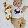 Mathias-Gabriel a rejoint le concours — aidez-le/la à gagner de superbes lots ! baby, teddy_bear, stuffed_animal, pajamas, cushion, white_bedding, smiling, infant, cute, lying_down, indoors, soft_toys, child, portrait, sleepwear, relaxed, home, comfort, toy, happy