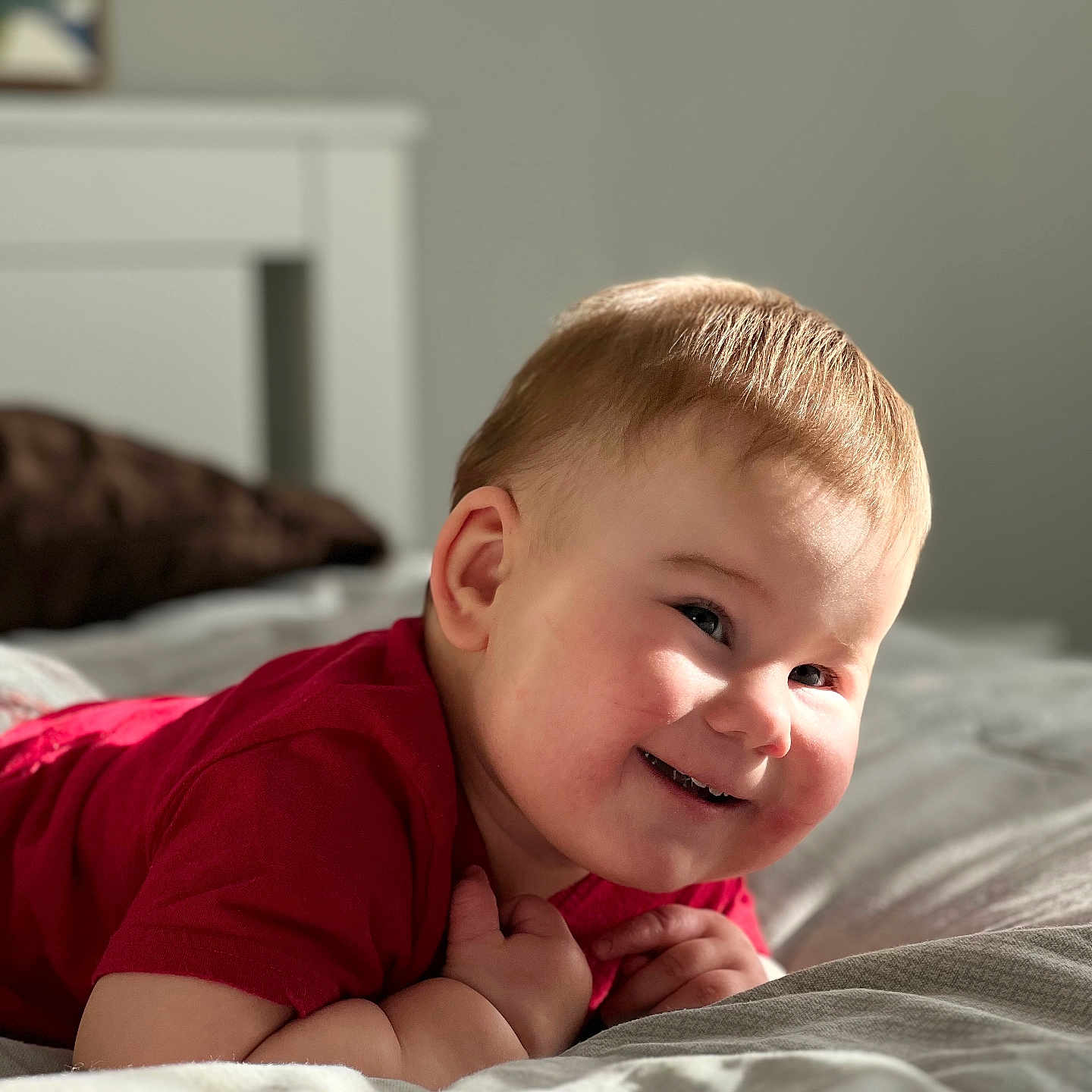 Alise joined the competition — help win amazing prizes! baby, babylaughing, bed, bedroom, bodypart, cushion, face, finger, furniture, hand, happy, head, homedecor, indoors, laughing, person, photography, portrait, room, smile